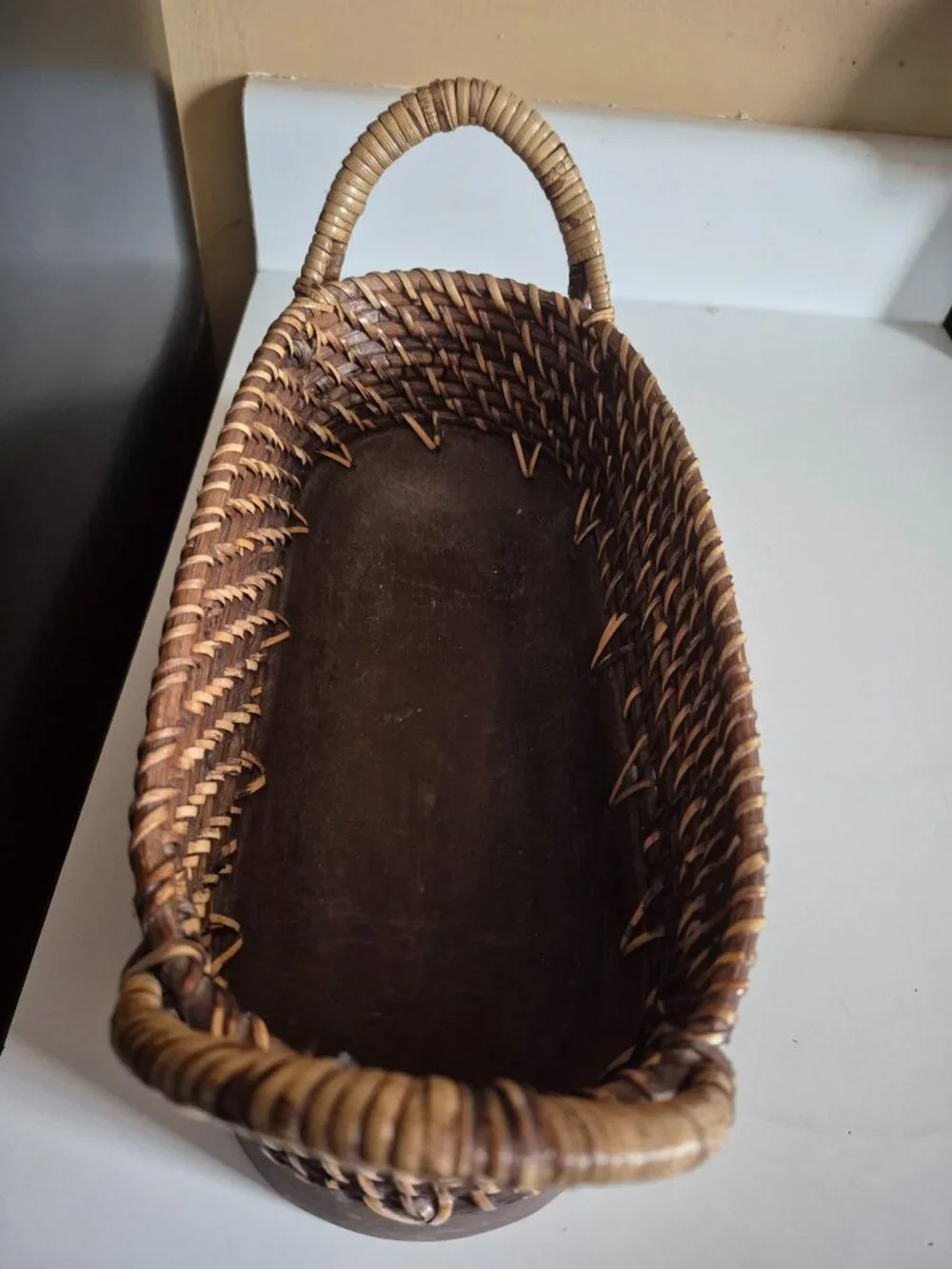 OVAL HAND-WOVEN WICKER STORAGE BASKET